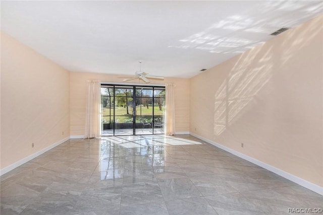 3356 N Bent Tree Pt, Lecanto, FL 34461 - empty room featuring a ceiling fan and marble finish flooring