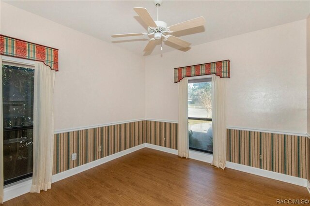 full bathroom with tile patterned flooring, vanity, combined bath / shower with glass door, and toilet