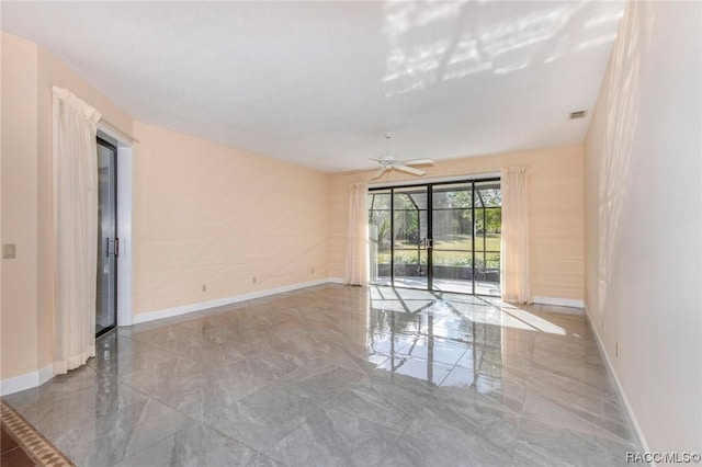 3356 N Bent Tree Pt, Lecanto, FL 34461 - spare room featuring ceiling fan and marble finish floors