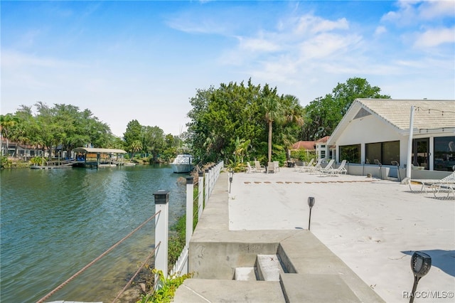 dock area with a water view