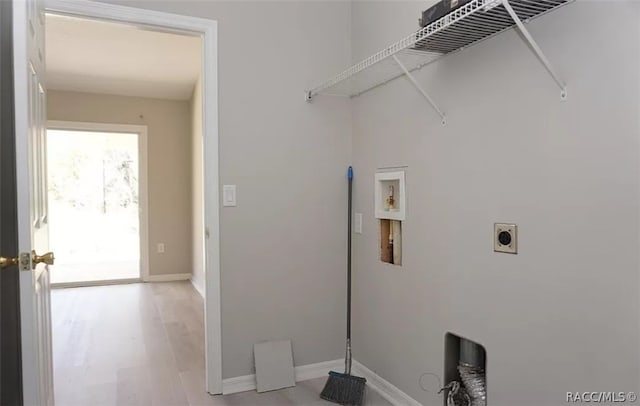 washroom with washer hookup, light wood-type flooring, and electric dryer hookup