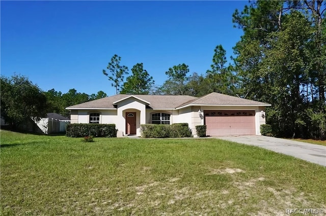 ranch-style house with a front yard and a garage