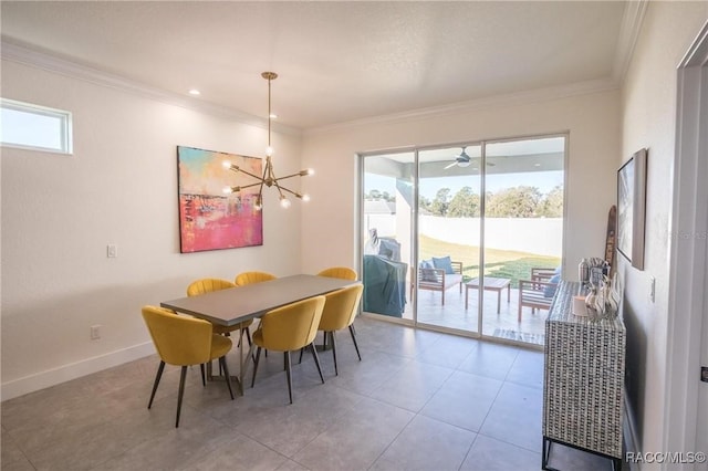 tiled dining area featuring crown molding and an inviting chandelier