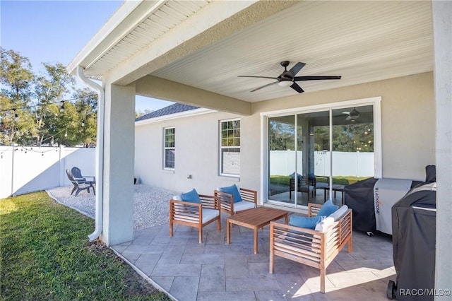 view of patio / terrace featuring an outdoor living space and ceiling fan