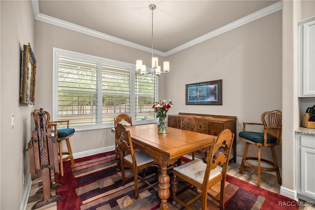 dining area with dark hardwood / wood-style flooring, crown molding, and a chandelier