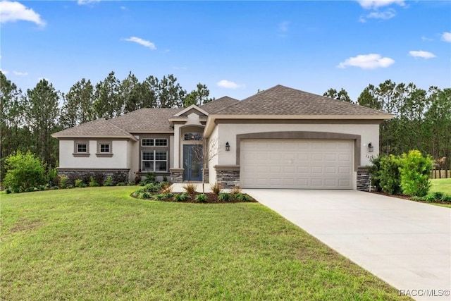 view of front of home featuring a garage and a front yard