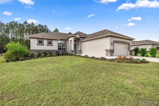 view of front of home featuring a garage and a front lawn