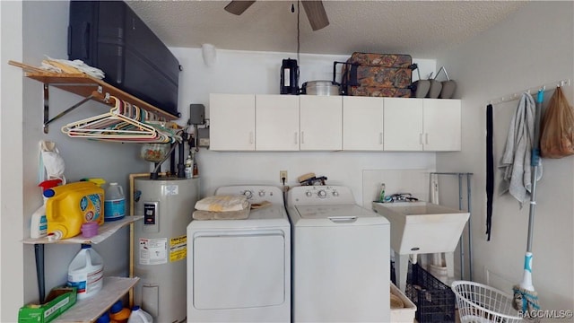 washroom featuring a ceiling fan, washer and clothes dryer, a textured ceiling, water heater, and cabinet space