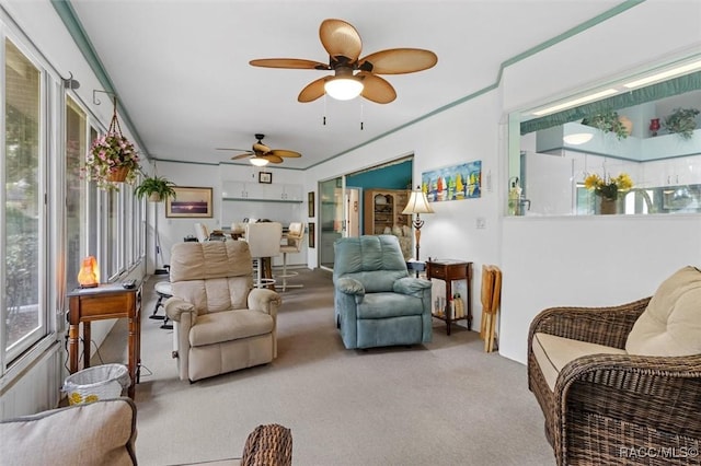 1491 N Chapelcross Loop, Crystal River, FL 34429 - living area featuring plenty of natural light, a ceiling fan, and carpet