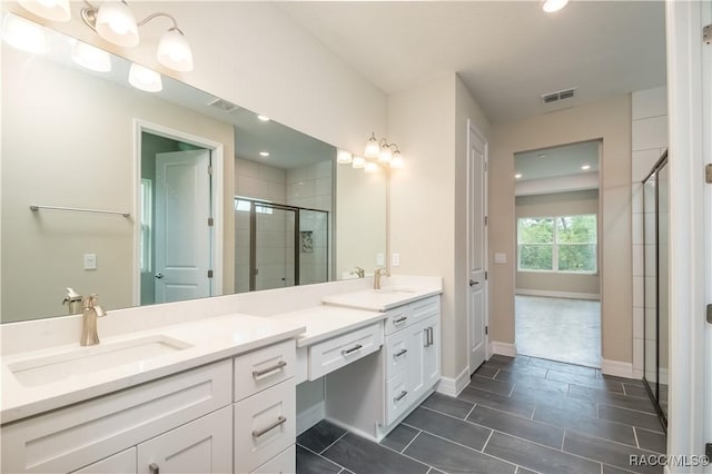 bathroom featuring vanity and walk in shower