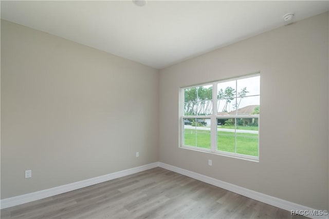 empty room featuring light hardwood / wood-style floors