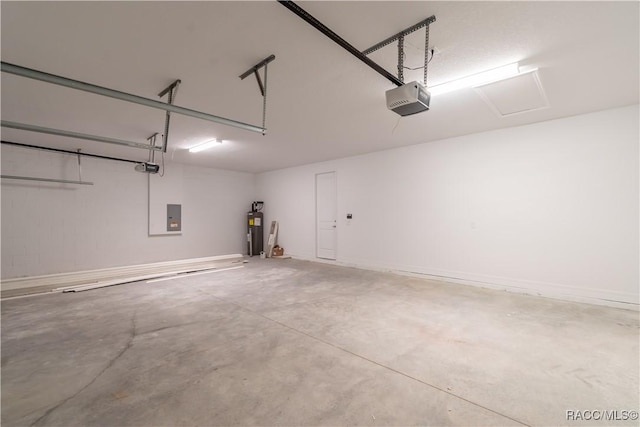 garage with a garage door opener, electric panel, and water heater