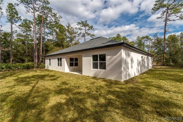 view of home's exterior featuring a yard