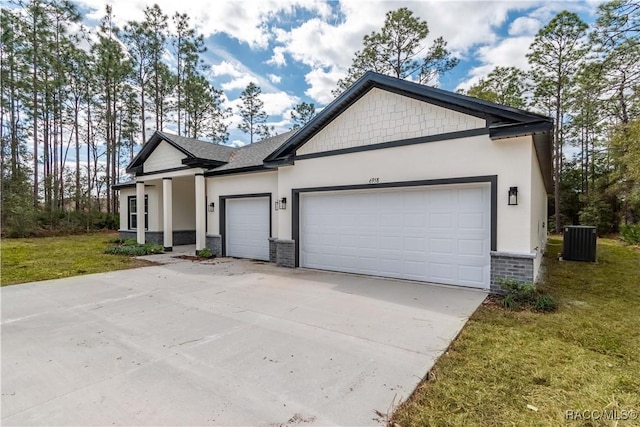 craftsman inspired home featuring central AC, a garage, and a front yard