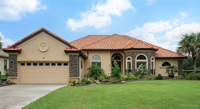 mediterranean / spanish-style house featuring a front lawn and a garage