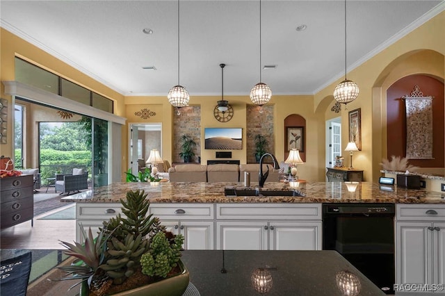 kitchen featuring sink, dark stone countertops, ornamental molding, black dishwasher, and white cabinetry