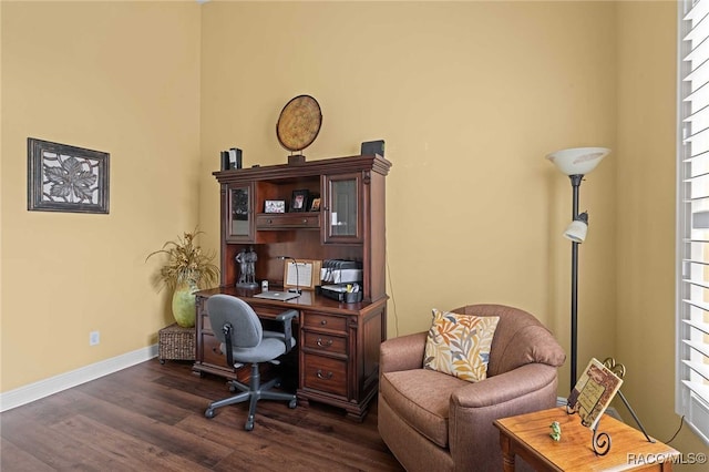 home office featuring dark hardwood / wood-style flooring