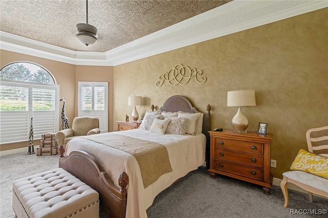 carpeted bedroom with a textured ceiling, ceiling fan, and crown molding