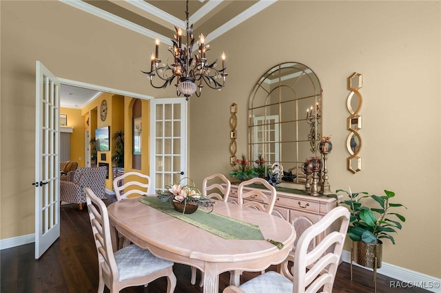 dining area featuring french doors, dark hardwood / wood-style floors, crown molding, and a notable chandelier