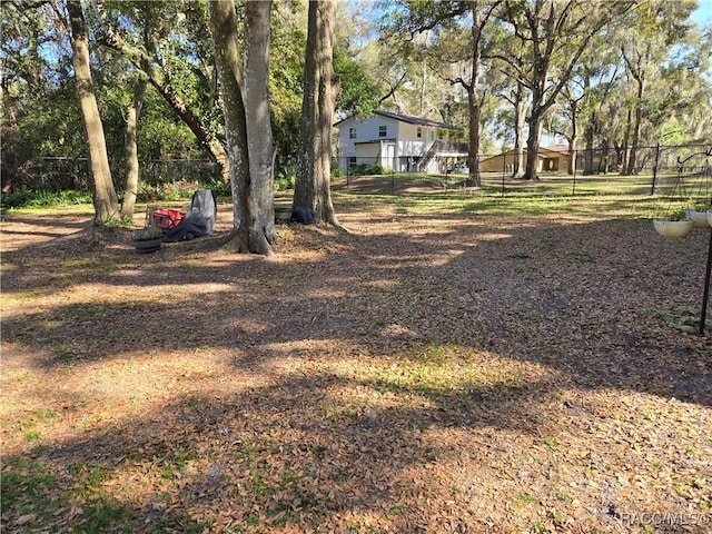 view of yard with fence