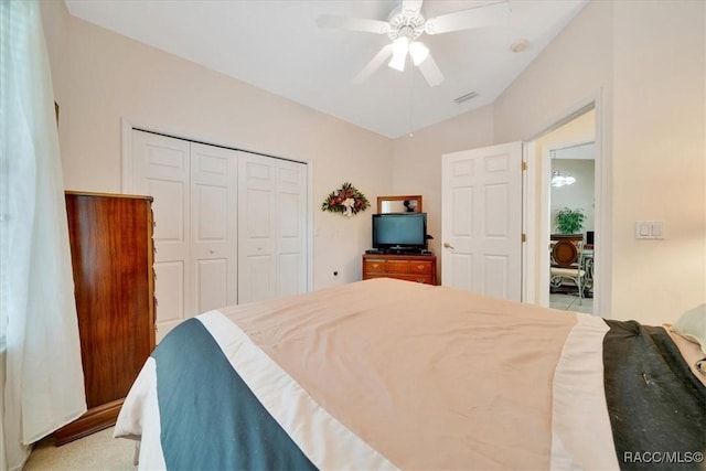 374 W Wason St, Citrus Springs, FL 34434 - bedroom featuring a closet, a ceiling fan, and vaulted ceiling