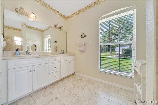 374 W Wason St, Citrus Springs, FL 34434 - bathroom with double vanity and baseboards