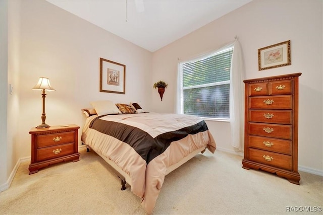 374 W Wason St, Citrus Springs, FL 34434 - bedroom featuring light colored carpet and a ceiling fan