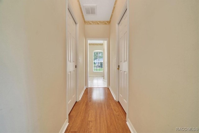 374 W Wason St, Citrus Springs, FL 34434 - hallway featuring light wood-style flooring and baseboards