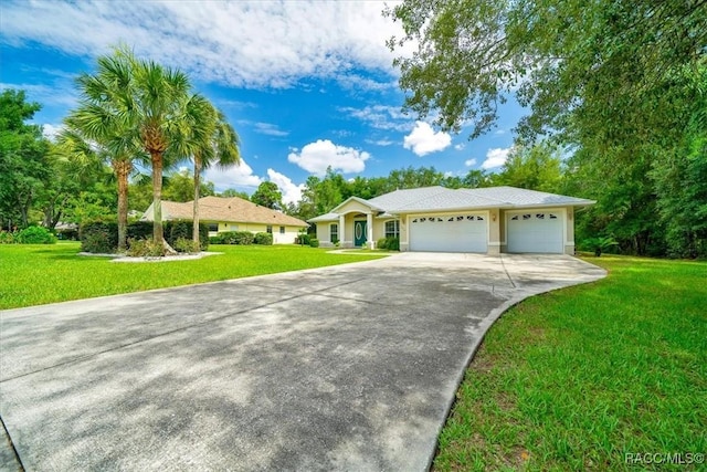 374 W Wason St, Citrus Springs, FL 34434 - ranch-style house featuring concrete driveway, an attached garage, and a front yard