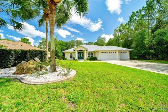 374 W Wason St, Citrus Springs, FL 34434 - ranch-style home featuring a garage, driveway, a front yard, and stucco siding