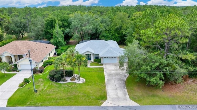 374 W Wason St, Citrus Springs, FL 34434 - aerial view of property and surrounding area with a forest