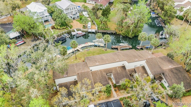 bird's eye view featuring a residential view and a water view