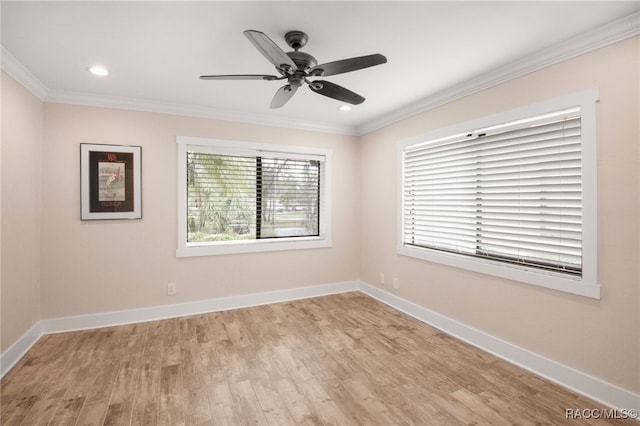 unfurnished room with a ceiling fan, baseboards, recessed lighting, light wood-style floors, and crown molding