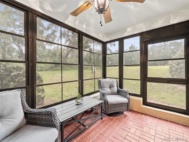 sunroom / solarium with ceiling fan