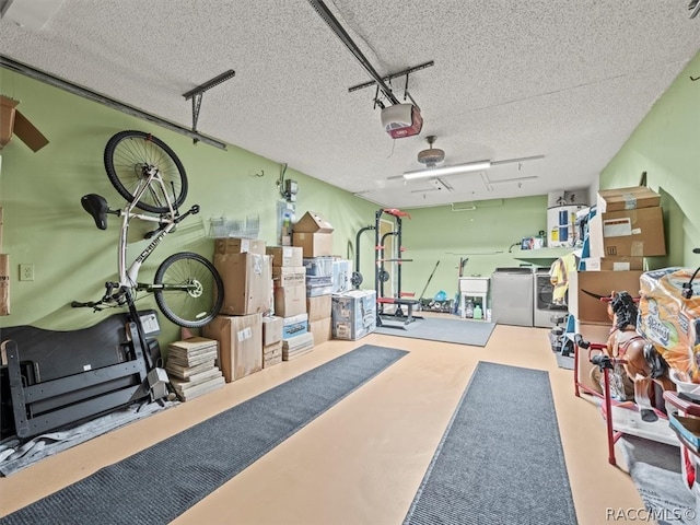 garage featuring a garage door opener and washer and clothes dryer