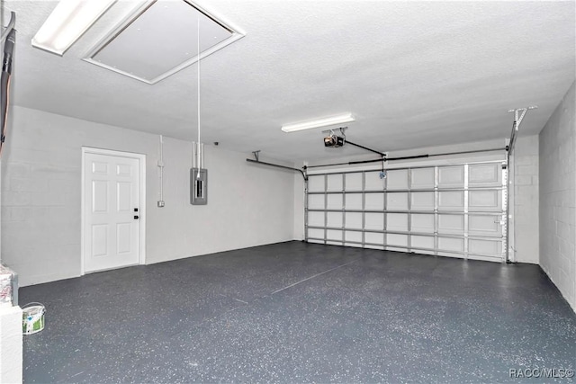 4065 SW 5th Ave, Ocala, FL 34471 - garage featuring a garage door opener and electric panel