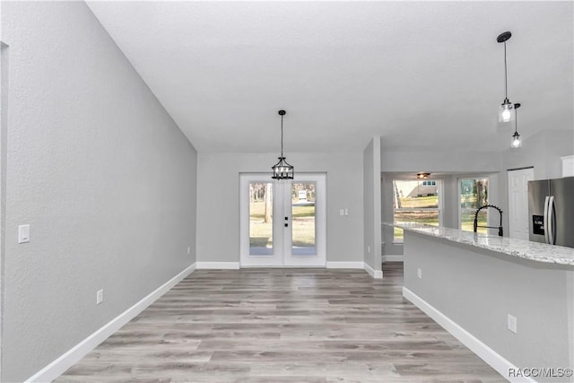 4065 SW 5th Ave, Ocala, FL 34471 - interior space with sink, french doors, and light wood-type flooring