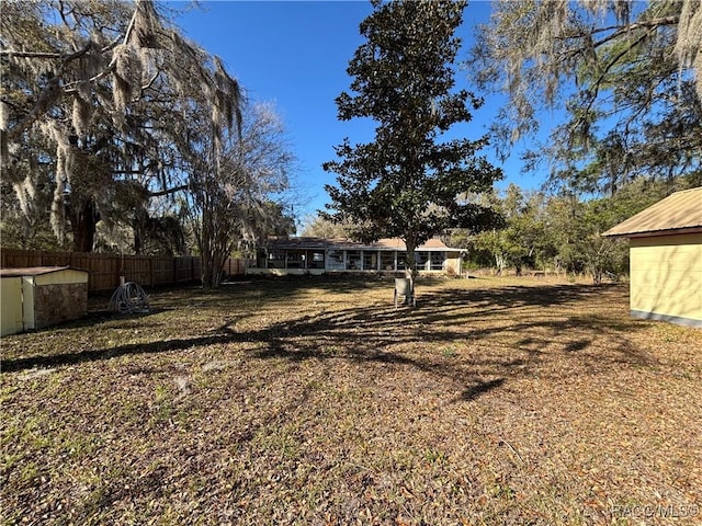 view of yard with fence