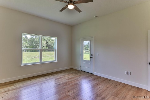 783 E Alaska Ln, Hernando, FL 34442 - empty room with plenty of natural light, a ceiling fan, and light wood-style flooring