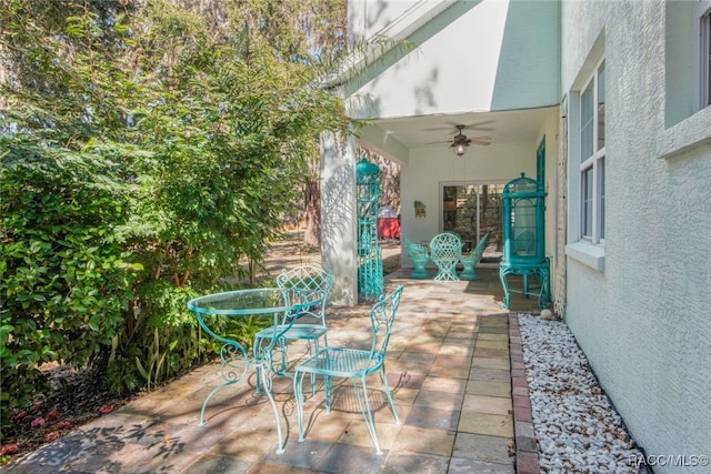 view of patio / terrace with ceiling fan