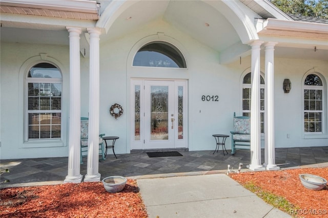 entrance to property with a porch