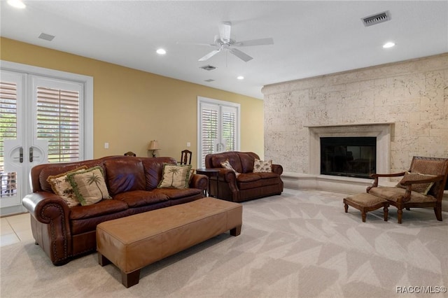 4160 W Bonanza Dr, Beverly Hills, FL 34465 - living area with ceiling fan, light colored carpet, recessed lighting, french doors, and a glass covered fireplace