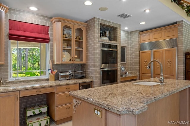4160 W Bonanza Dr, Beverly Hills, FL 34465 - kitchen with double oven, decorative backsplash, light stone countertops, and recessed lighting