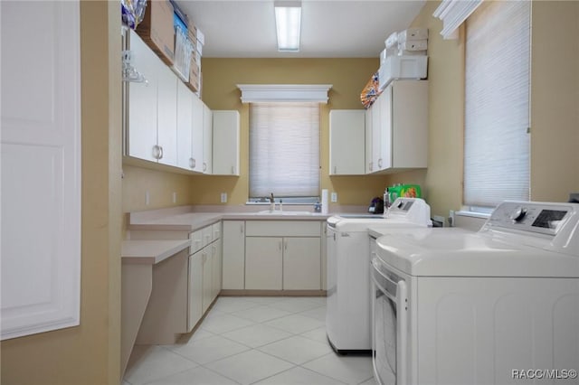 4160 W Bonanza Dr, Beverly Hills, FL 34465 - laundry room featuring separate washer and dryer, cabinet space, and light tile patterned floors