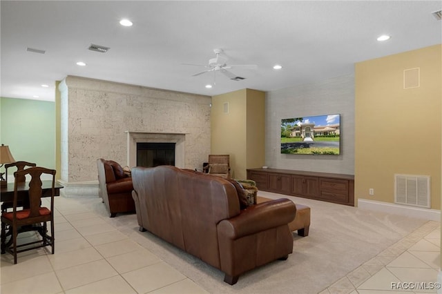 4160 W Bonanza Dr, Beverly Hills, FL 34465 - living area featuring recessed lighting, a ceiling fan, light tile patterned floors, light colored carpet, and a fireplace