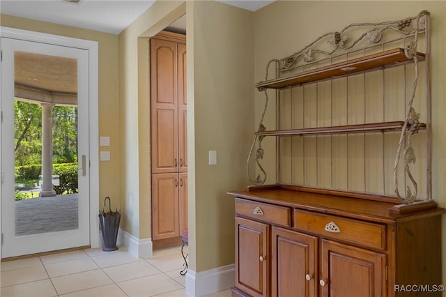 4160 W Bonanza Dr, Beverly Hills, FL 34465 - entryway with light tile patterned floors and baseboards