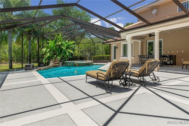 4160 W Bonanza Dr, Beverly Hills, FL 34465 - view of swimming pool with a ceiling fan, a patio area, and a pool with connected hot tub