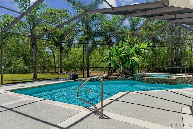 4160 W Bonanza Dr, Beverly Hills, FL 34465 - view of swimming pool with a patio area, a pool with connected hot tub, a lanai, and view of scattered trees