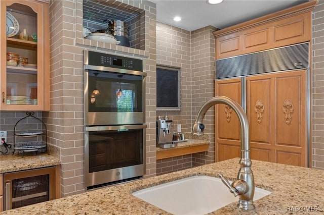 4160 W Bonanza Dr, Beverly Hills, FL 34465 - kitchen featuring stainless steel double oven, wine cooler, a sink, backsplash, and recessed lighting