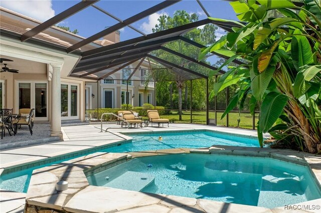 4160 W Bonanza Dr, Beverly Hills, FL 34465 - view of pool with a pool with connected hot tub, a patio, french doors, and ceiling fan
